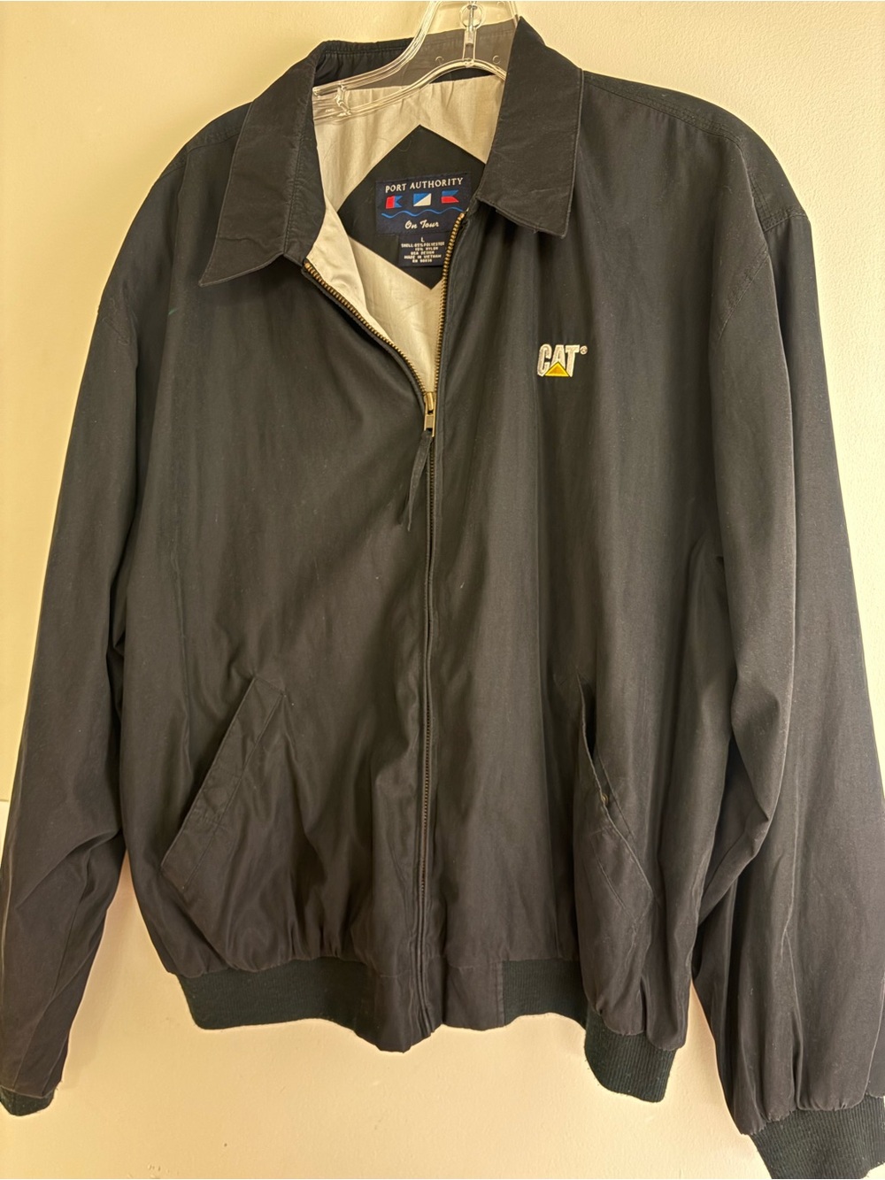 Port Authority Black Bomber Jacket with CAT Logo